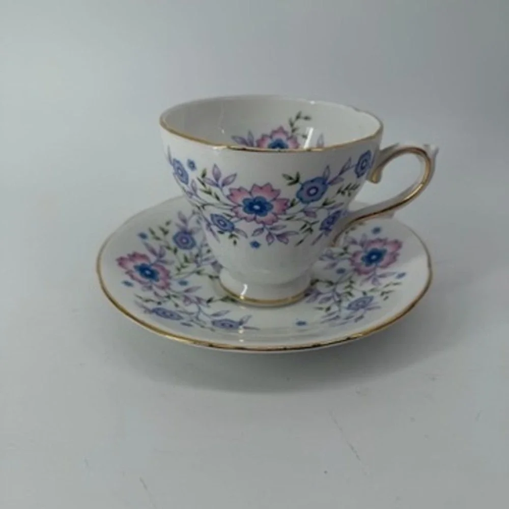 Avon Blue Blossoms Tea Cup and Saucer Set Fine Bone China England 1974 Vintage